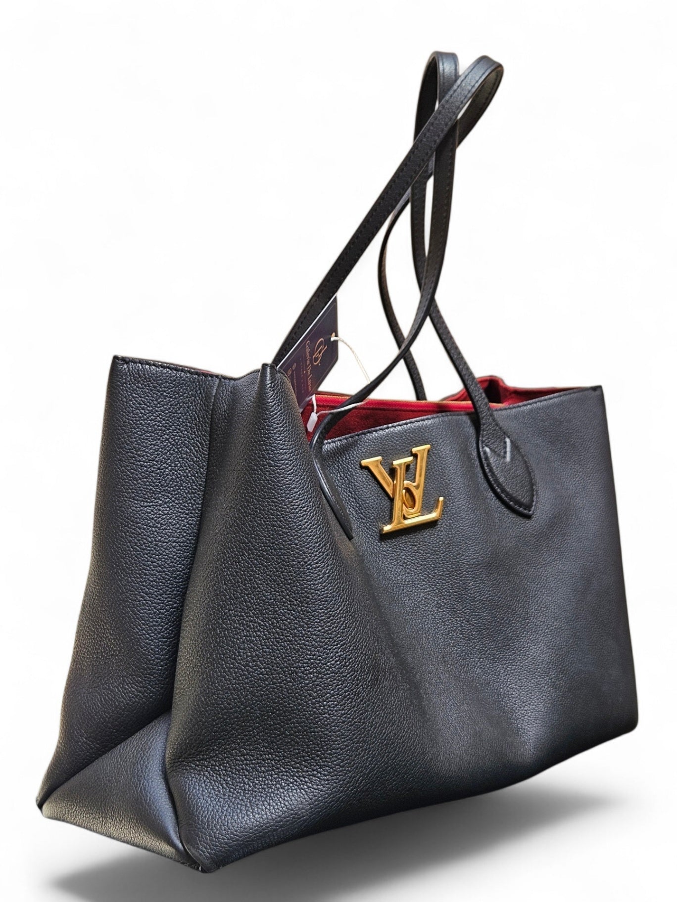 Louis Vuitton Lockme Shopper; golden emblem; Negro; Red line inside 