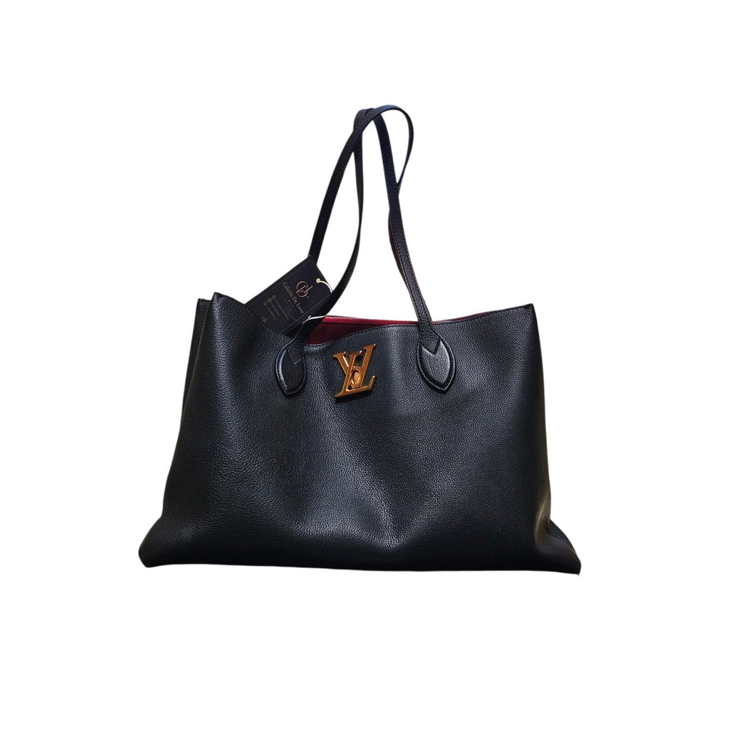 Louis Vuitton Lockme Shopper; golden emblem; Negro; Red line inside 