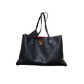 Louis Vuitton Lockme Shopper; golden emblem; Negro; Red line inside 